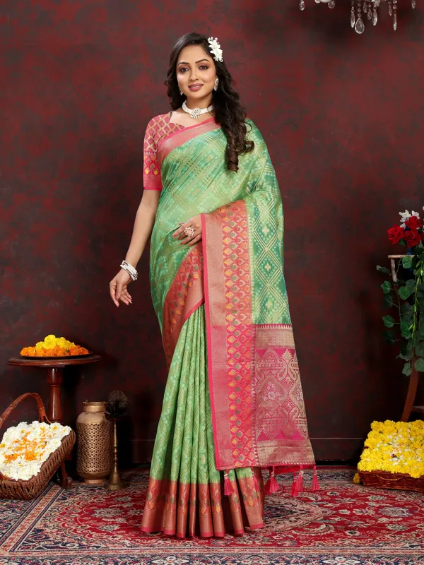 Pista_Green_Soft_Organza_Silk_With_Meenakari_Weaving_Design_And_Rich_Meenakari_Weaving_Pallu_Saree