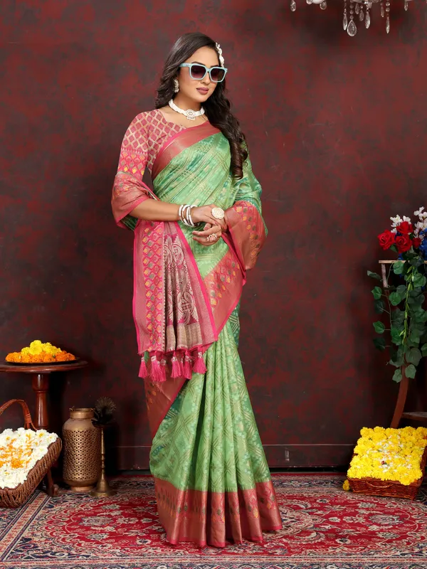 Pista_Green_Soft_Organza_Silk_With_Meenakari_Weaving_Design_And_Rich_Meenakari_Weaving_Pallu_Saree
