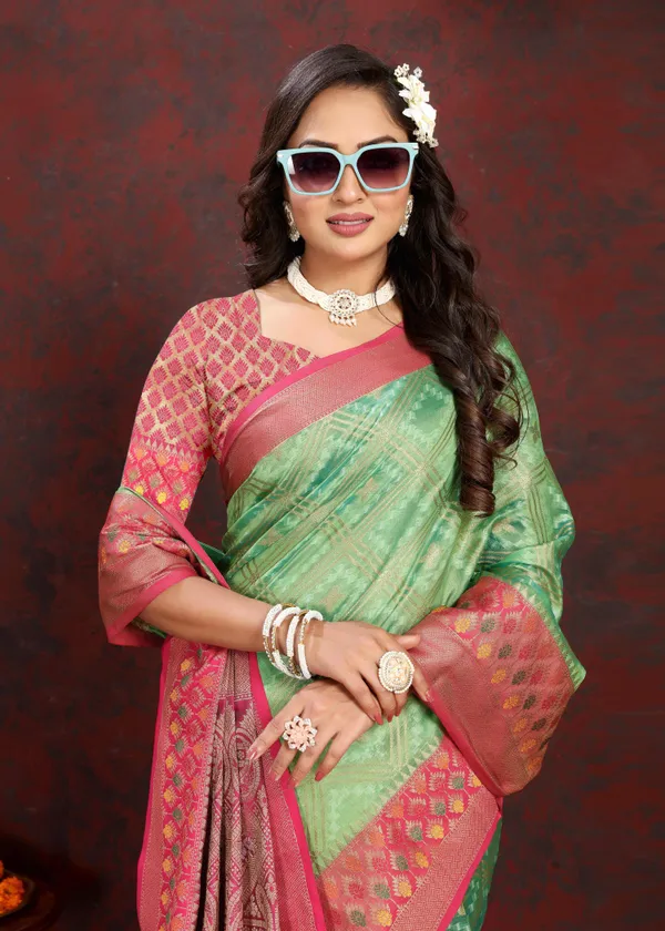Pista_Green_Soft_Organza_Silk_With_Meenakari_Weaving_Design_And_Rich_Meenakari_Weaving_Pallu_Saree