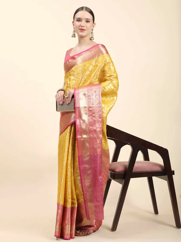 Yellow_Soft_Banarasi_Silk_With_Beautiful_Gold_Zari_Weaving_With_Rich_Pallu_Saree