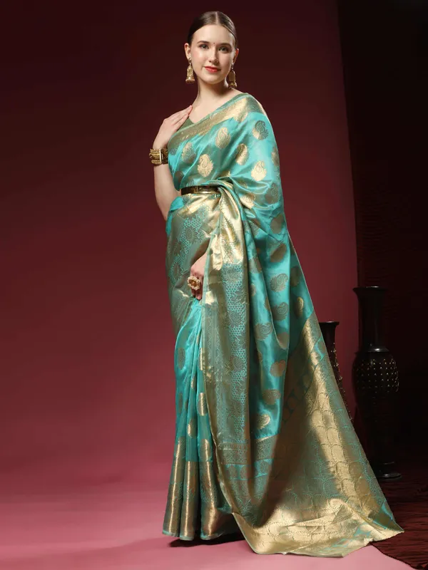 Teal_Blue_Organza_Silk_With_Beautiful_Gold_Zari_Weaving_With_Rich_Pallu_Saree