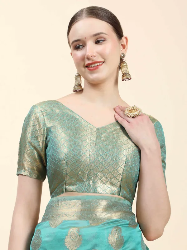 Teal_Blue_Organza_Silk_With_Beautiful_Gold_Zari_Weaving_With_Rich_Pallu_Saree