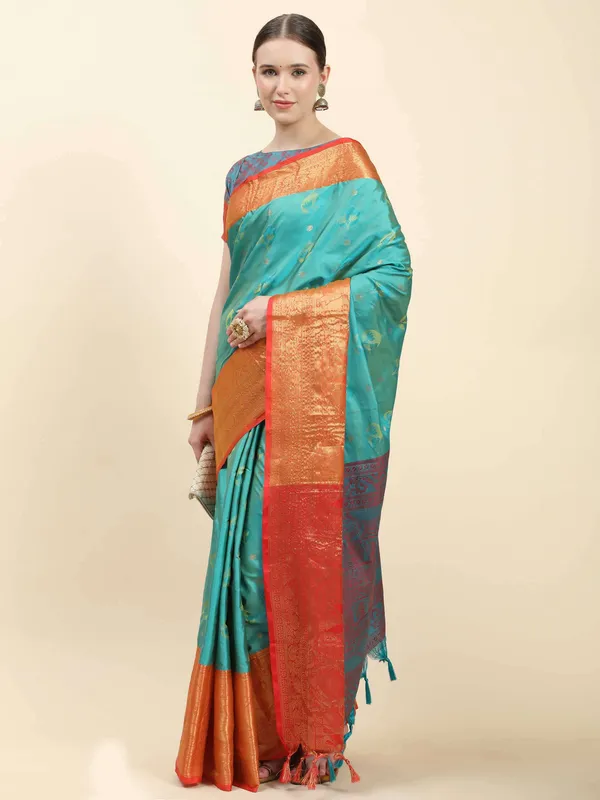 Peacoke_Blue_Soft_Kanjivaram_Rich_Pallu_Self_Jacquard_Weaving_With_Gold_Zari_Saree