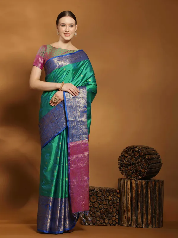 Teal_Blue_Soft_Kanjivaram_Rich_Pallu_Self_Jacquard_Weaving_With_Gold_Zari_Saree