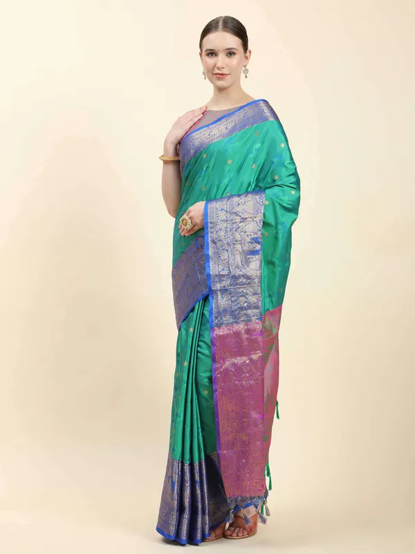 Teal_Blue_Soft_Kanjivaram_Rich_Pallu_Self_Jacquard_Weaving_With_Gold_Zari_Saree