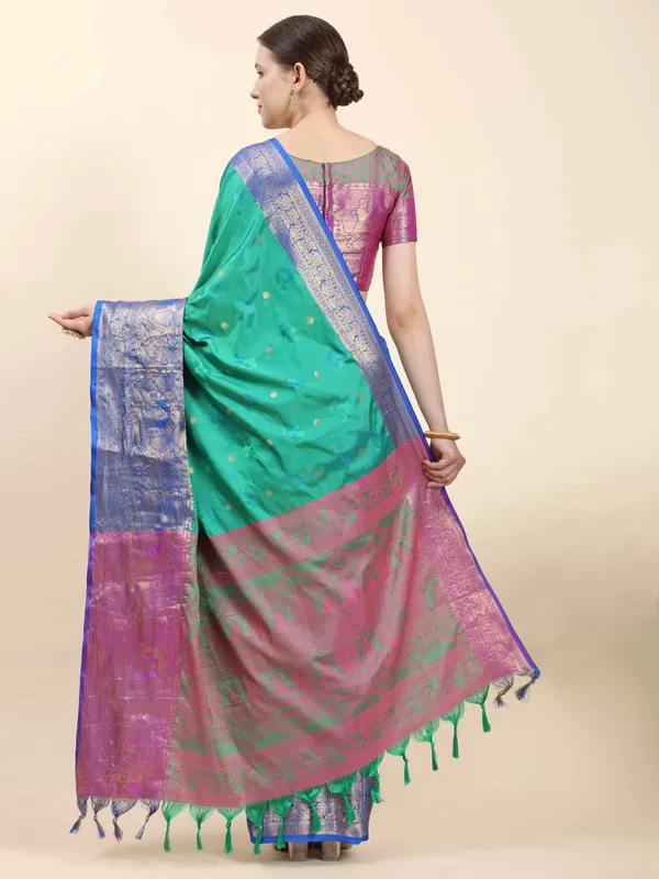 Teal_Blue_Soft_Kanjivaram_Rich_Pallu_Self_Jacquard_Weaving_With_Gold_Zari_Saree