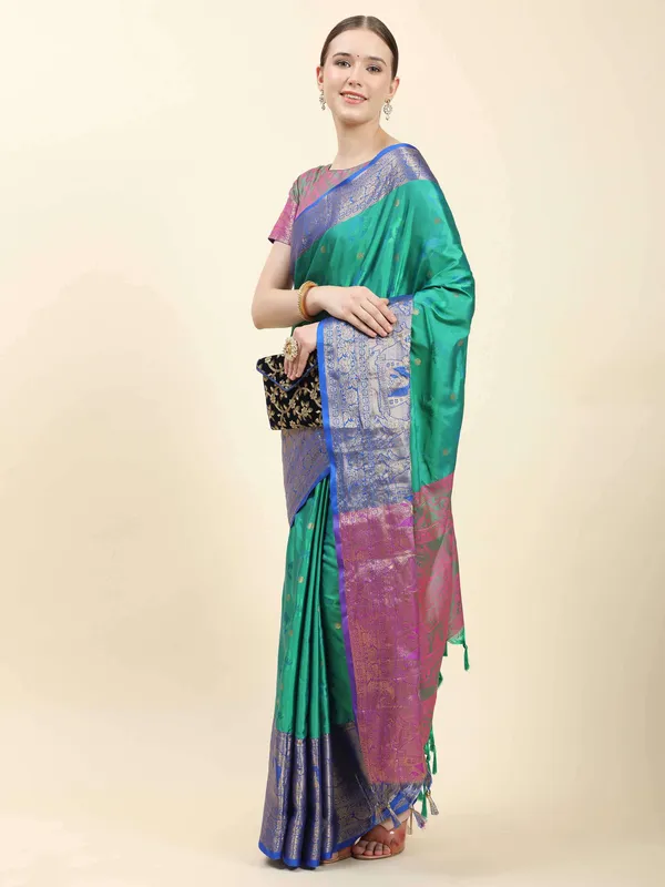 Teal_Blue_Soft_Kanjivaram_Rich_Pallu_Self_Jacquard_Weaving_With_Gold_Zari_Saree