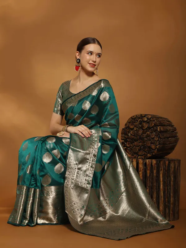 Teal_Blue_Organza_Silk_With_Beautiful_Gold_Zari_Weaving_With_Rich_Pallu_Saree