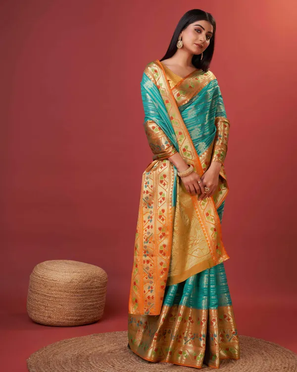 Teal_Blue_Pure_Lichi_Silk_With_Beautiful_Gold_Zari_Weaving_With_Heavy_Rich_Pallu_Saree