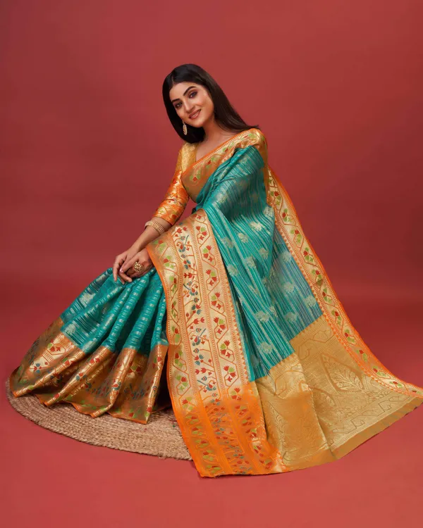 Teal_Blue_Pure_Lichi_Silk_With_Beautiful_Gold_Zari_Weaving_With_Heavy_Rich_Pallu_Saree