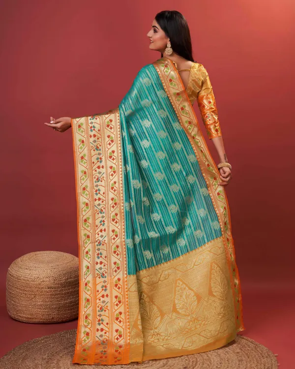 Teal_Blue_Pure_Lichi_Silk_With_Beautiful_Gold_Zari_Weaving_With_Heavy_Rich_Pallu_Saree