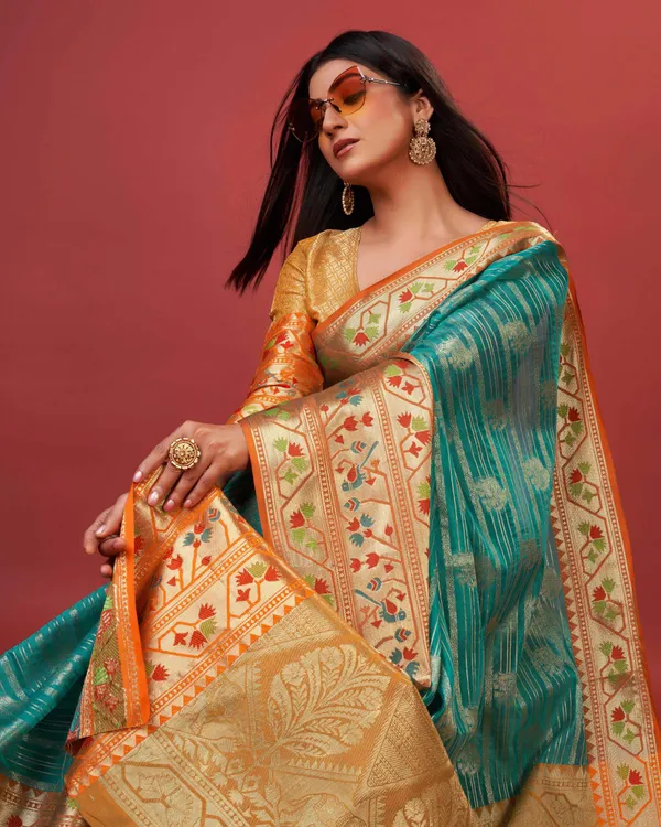 Teal_Blue_Pure_Lichi_Silk_With_Beautiful_Gold_Zari_Weaving_With_Heavy_Rich_Pallu_Saree