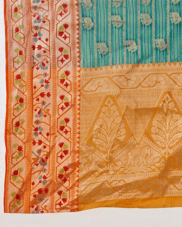 Teal_Blue_Pure_Lichi_Silk_With_Beautiful_Gold_Zari_Weaving_With_Heavy_Rich_Pallu_Saree