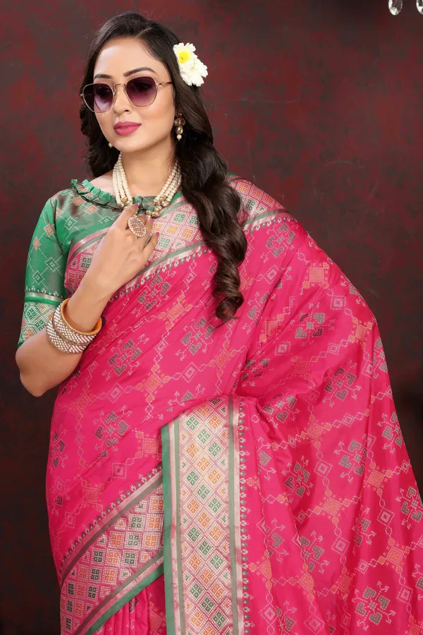 Pink_Soft_Patola_Silk_With_Meenakari_Zari_Weaving_Patterns_And_Rich_Zari_Weaving_Pallu_Saree
