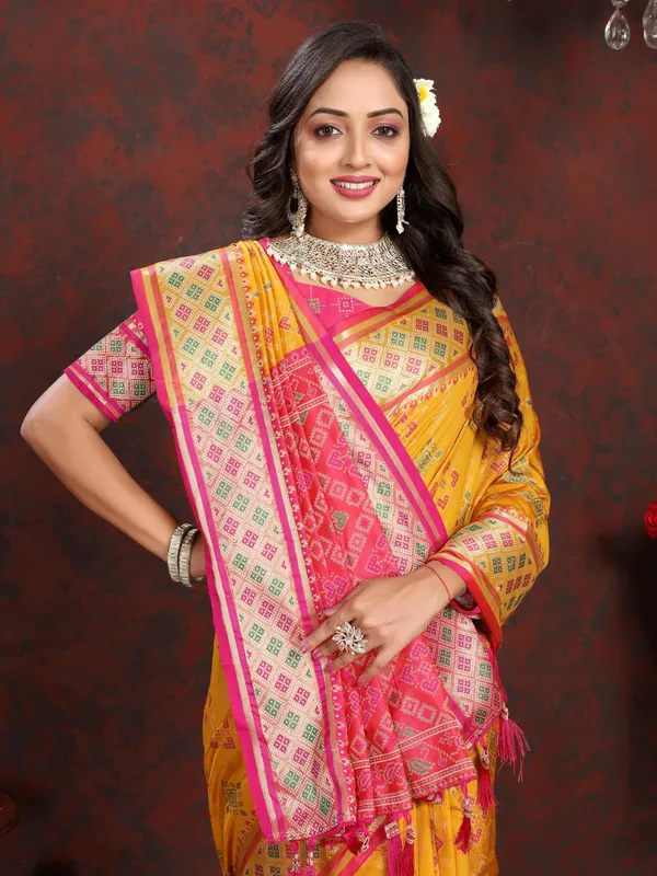 Yellow_Soft_Patola_Silk_With_Meenakari_Zari_Weaving_Patterns_And_Rich_Zari_Weaving_Pallu_Saree