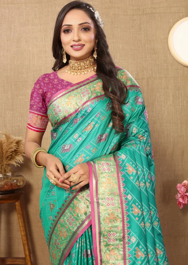 Green_Soft_Patola_Silk_With_Meenakari_Zari_Weaving_Patterns_And_Rich_Zari_Weaving_Pallu_Saree