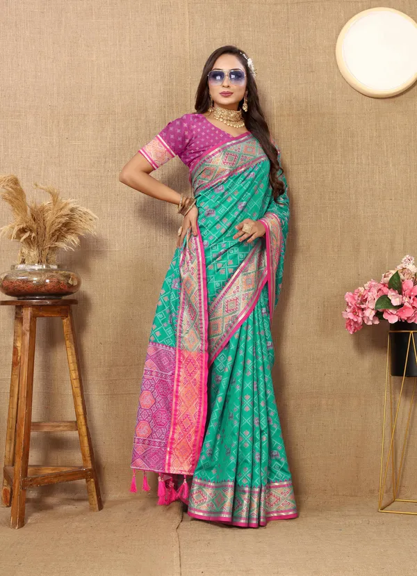 Green_Soft_Patola_Silk_With_Meenakari_Zari_Weaving_Patterns_And_Rich_Zari_Weaving_Pallu_Saree