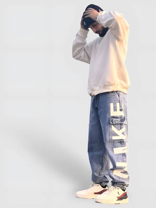 NIKE_LIGHT_BLUE_LOOSE_FIT_PURE_COTTON_JOGGER_FIT_JEANS_FOR_MEN.