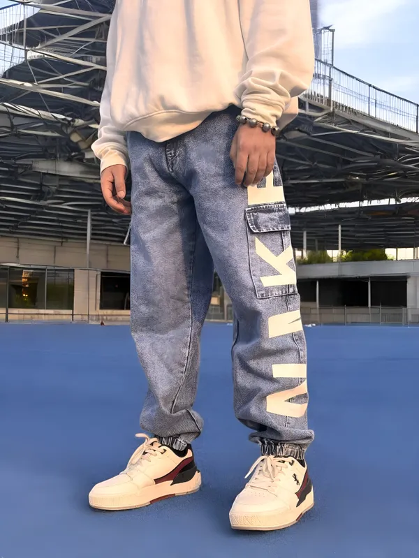 NIKE_LIGHT_BLUE_LOOSE_FIT_PURE_COTTON_JOGGER_FIT_JEANS_FOR_MEN.