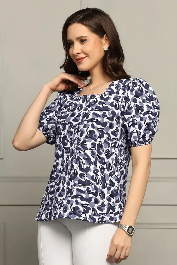 Blue_Cotton_Blend_Abstract_Printed_Hip_Length_Top_For_Women