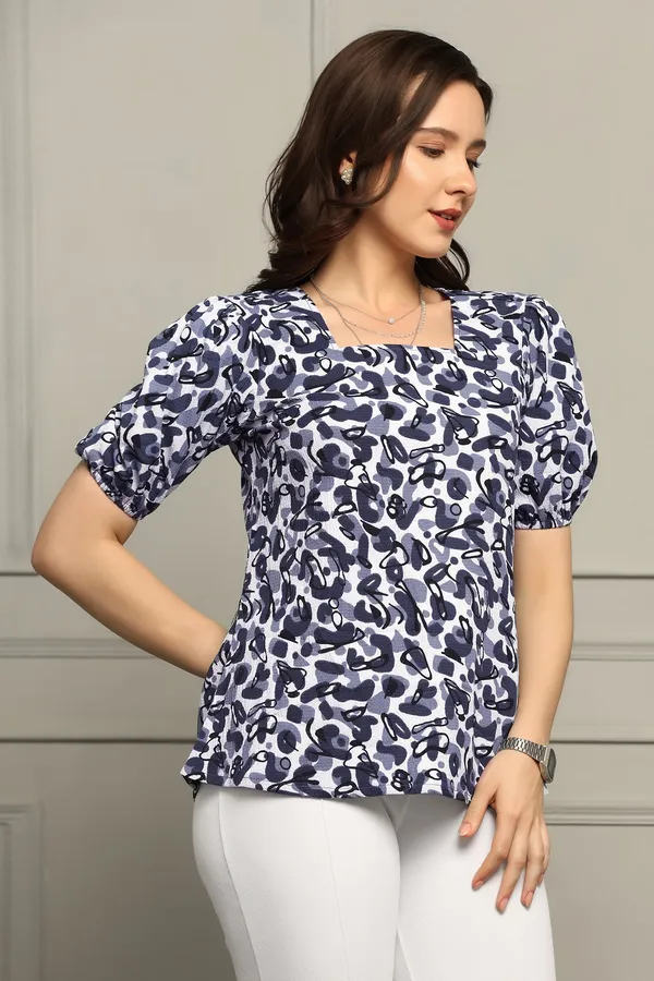 Blue_Cotton_Blend_Abstract_Printed_Hip_Length_Top_For_Women