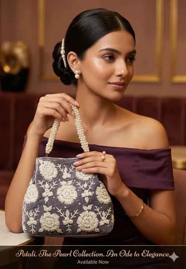 Handwrok_Embroider_designer_vintage-inspired_handbag_featuring_striking_contrast_and_intricate_detailing