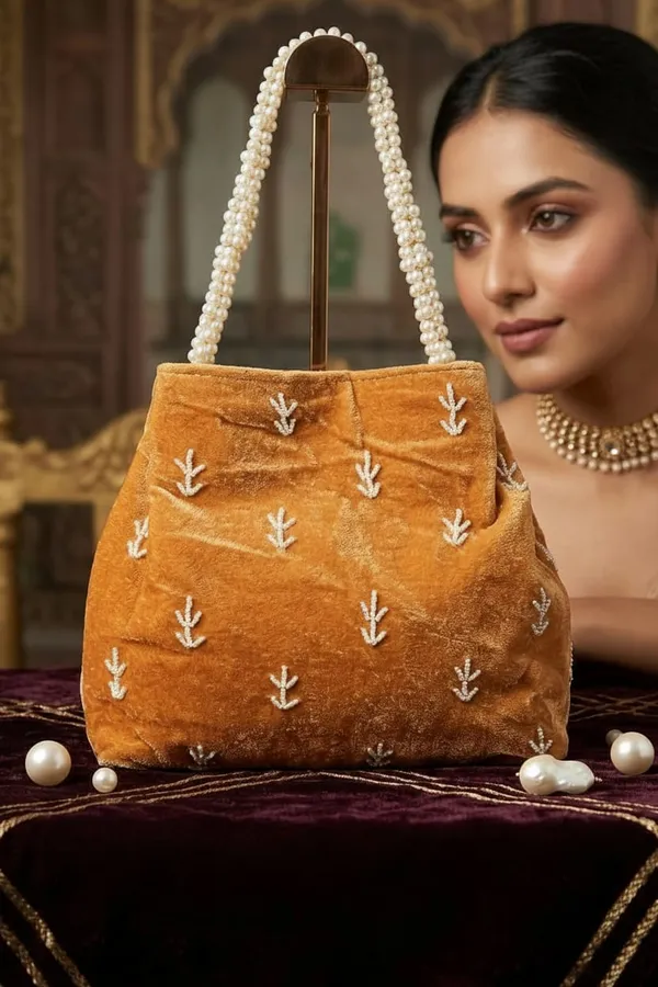 Handwrok_Embroider_designer_vintage-inspired_handbag_featuring_striking_contrast_and_intricate_detailing