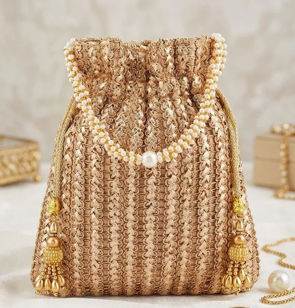 This_is_a_classic_Potli_bag,Beautiful_drawstring_pouch_often_used_in_traditional_fashion