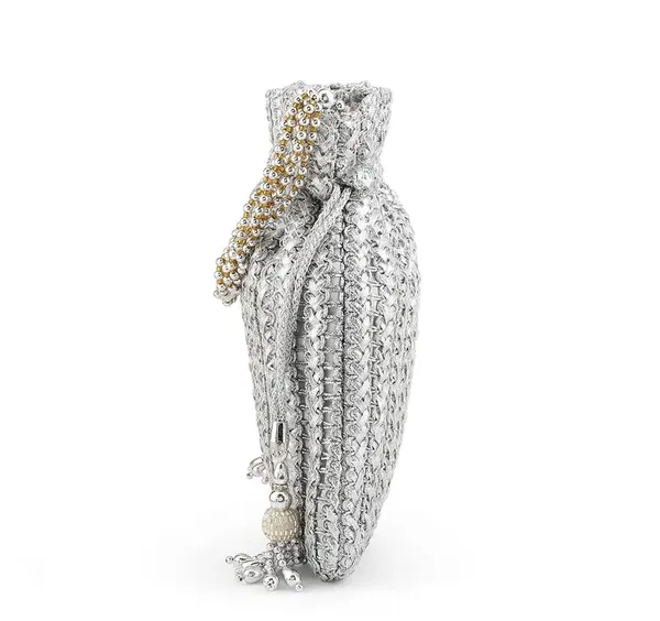 This_is_a_classic_Potli_bag,Beautiful_drawstring_pouch_often_used_in_traditional_fashion