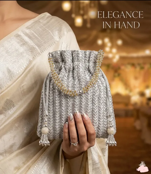 This_is_a_classic_Potli_bag,Beautiful_drawstring_pouch_often_used_in_traditional_fashion