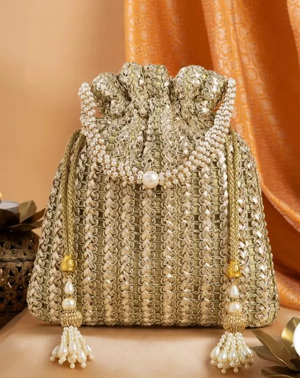 This_is_a_classic_Potli_bag,Beautiful_drawstring_pouch_often_used_in_traditional_fashion