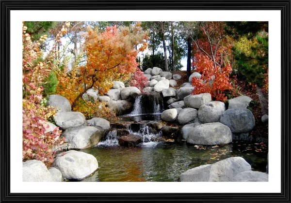 Waterfall_in_the_Rocks_in_the_Awesome_Blossom-_Nature_Theme_Wall_Decor,_Framed,_Multicolor