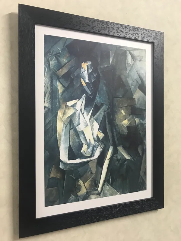 Seated_Woman_1923,_A_Painting_by_Pablo_Picasso,_Framed,_Wall_Decor,_Multicolor