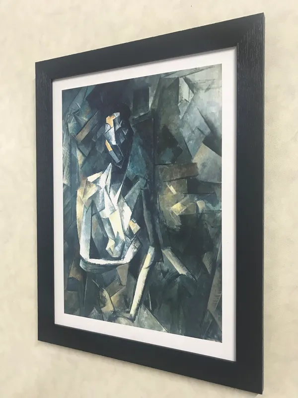 Seated_Woman_1923,_A_Painting_by_Pablo_Picasso,_Framed,_Wall_Decor,_Multicolor