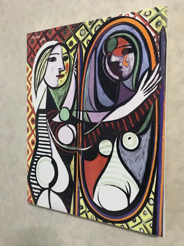 Girl_Before_A_Mirror_1932,_A_Painting_by_Pablo_Picasso,_Framed_Canvas,_Wall_Decor,_Multicolor