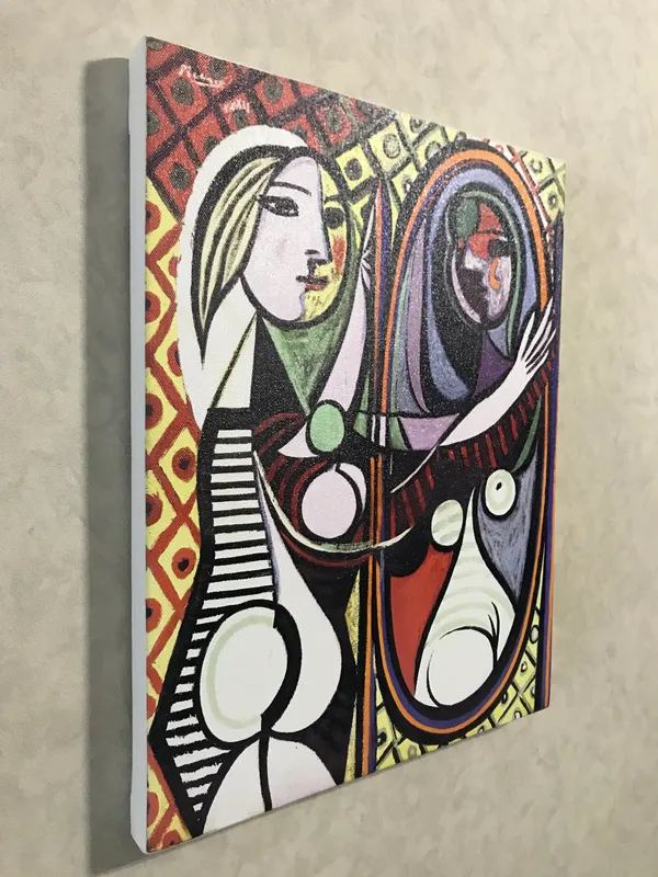 Girl_Before_A_Mirror_1932,_A_Painting_by_Pablo_Picasso,_Framed_Canvas,_Wall_Decor,_Multicolor