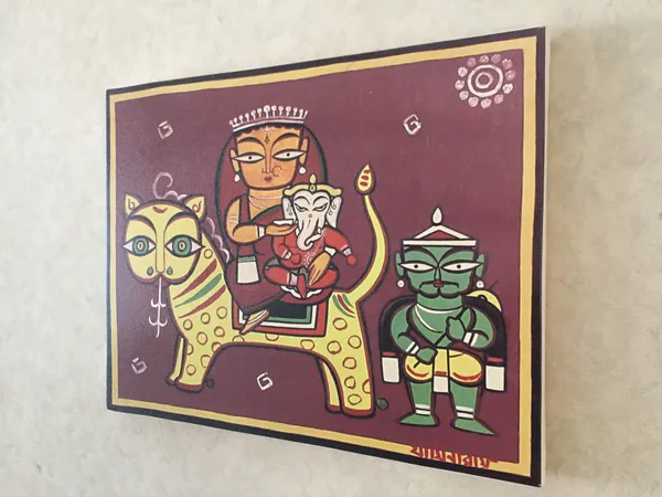 Parvati-Ganesh_on_'Vaahan'*_-_A_Jamini_Roy_Painting,_Framed_Canvas_Wall_Decor,_Multicolor