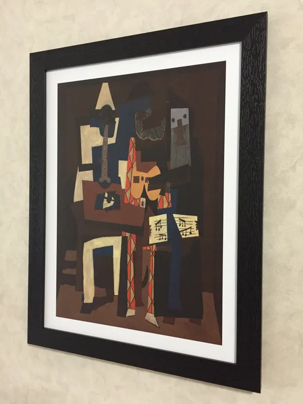 Three_Musicians_1921,_A_Painting_by_Pablo_Picasso,_Framed,_Wall_Decor,_Multicolor