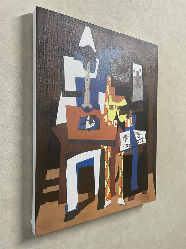 Three_Musicians_1921,_A_Painting_by_Pablo_Picasso,_Framed_Canvas,_Wall_Decor,_Multicolor