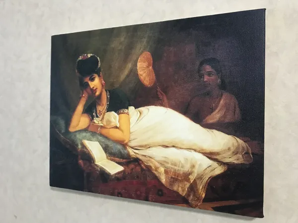 Reclining_Nayar_Lady,_1902,_A_Raja_Ravi_Varma_Painting,_Framed_Canvas,_Wall_Decor,_Multicolor