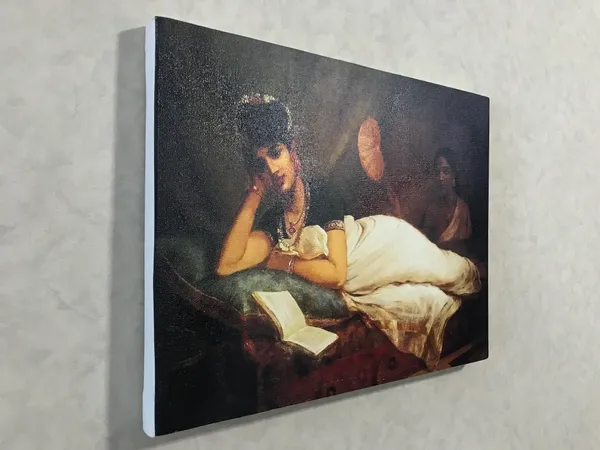 Reclining_Nayar_Lady,_1902,_A_Raja_Ravi_Varma_Painting,_Framed_Canvas,_Wall_Decor,_Multicolor