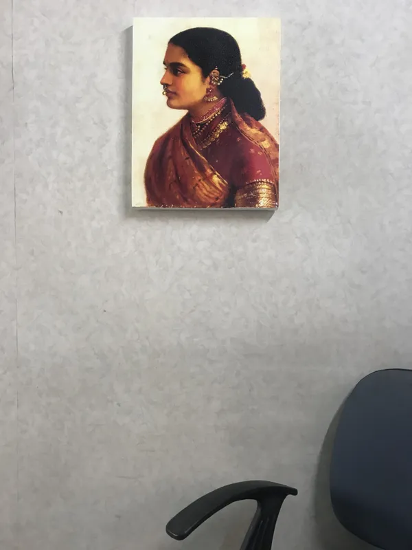 Lady_in_Crimson_Red_Saree,_1900,_A_Raja_Ravi_Varma_Painting,_Framed_Canvas,_Wall_Decor,_Multicolor