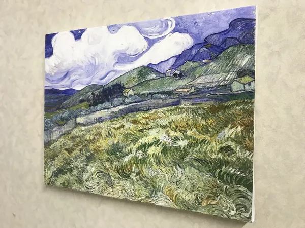 Wheatfield_and_Mountains_1889,_A_Painting_by_Van_Gogh,_Framed_Canvas,_Wall_Decor,_Multicolor