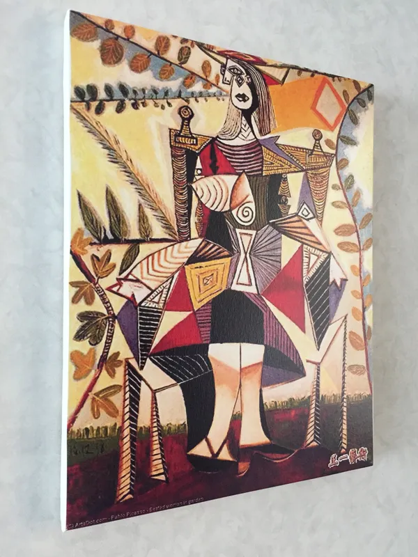 Seated_Woman_in_A_Garden,_1938,_A_Painting_by_Pablo_Picasso,_Framed_Canvas,_Wall_Decor,_Multicolor