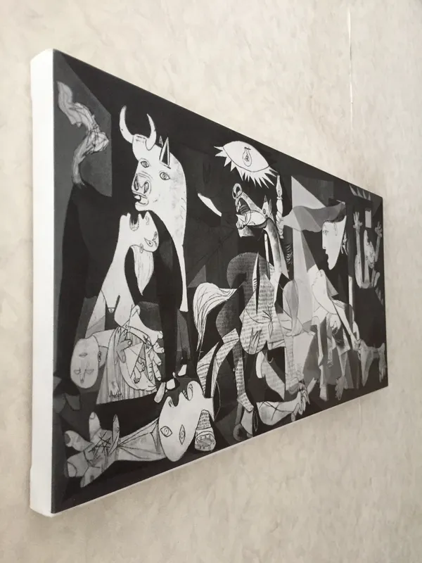 �Guernica_&_Massacre_in_Korea_,_Paintings_by_Pablo_Picasso,_Framed_Canvas,_Set_of_2,_Multicolor