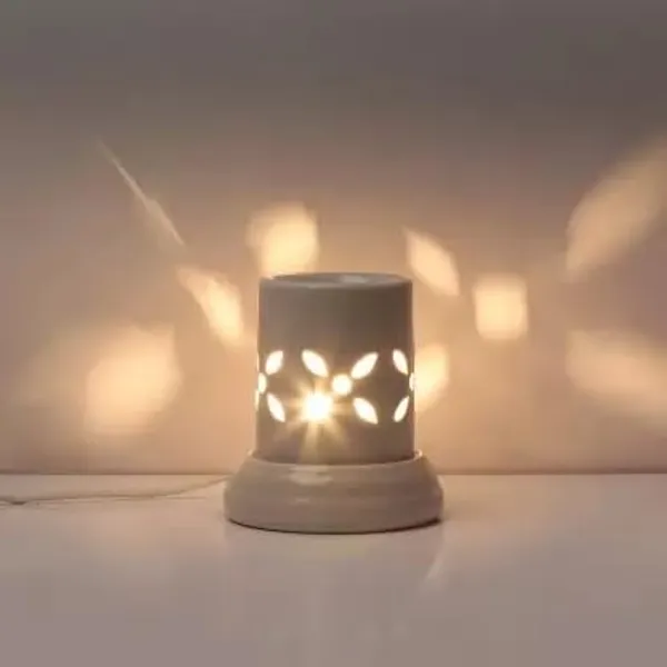 Ceramic_Electric_Aroma_Oil_Diffuser_Burner_for_Fragrance,_Round_(4.5_inch,_Ivory_White)