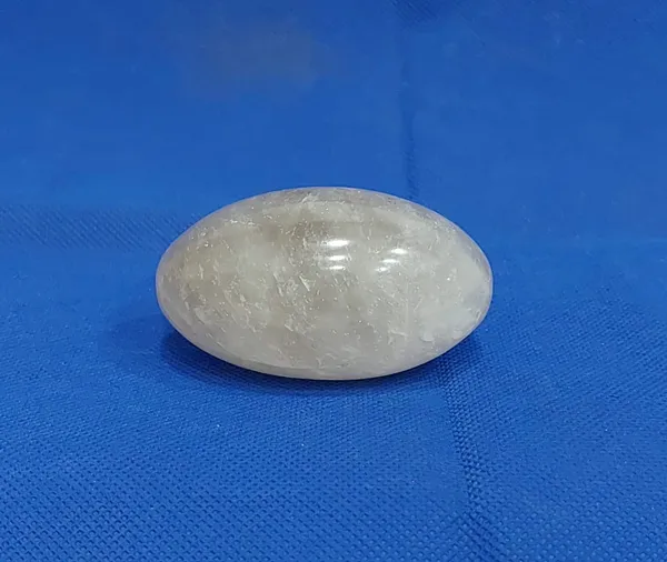 299_CLEAR_CRYSTAL_LINGAM_(_Weight_-_130_Gms_/_Width_-_1.5_Inch_/_Length_-_2.5_Inch_)