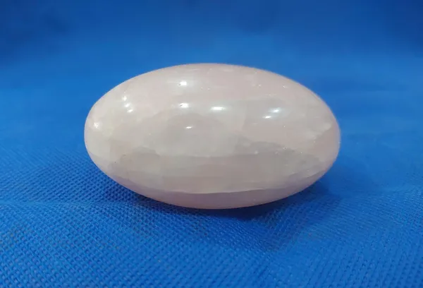 300_ROSE_QUARTZ_CRYSTAL_LINGAM_(_Weight_-_120_Gms_/_Width_-_1.5_Inch_/_Length_-_2.5_Inch_)