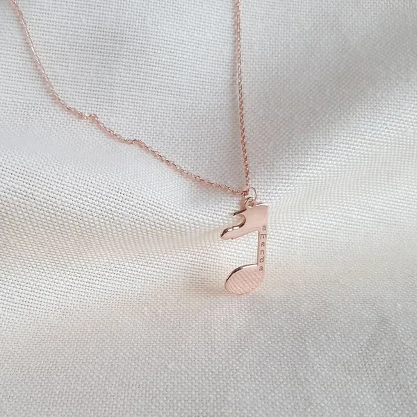 Customizable_Couple_Musicial_Note_Matching_Name_Puzzle_Necklace_Set_For_Unisex