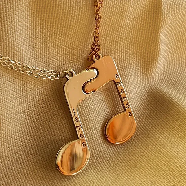 Customizable_Couple_Musicial_Note_Matching_Name_Puzzle_Necklace_Set_For_Unisex